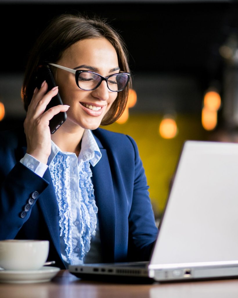 Business woman working in a cafe